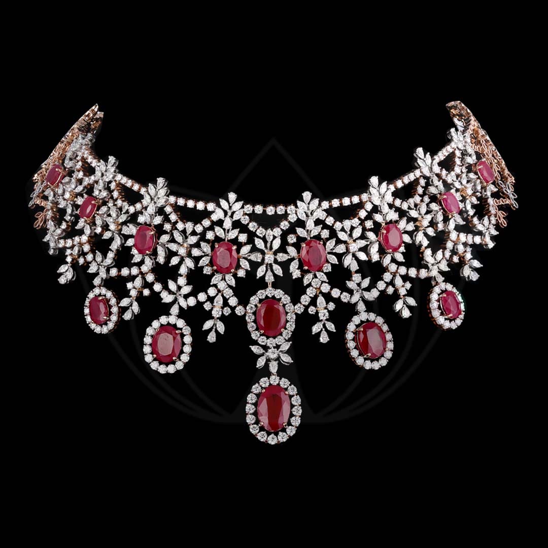 Flight of fantasy diamond choker necklace with royal ruby ovals.