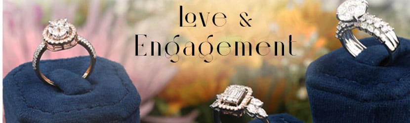 Three diamond rings kept in ring boxes and the picture reads love and engagement