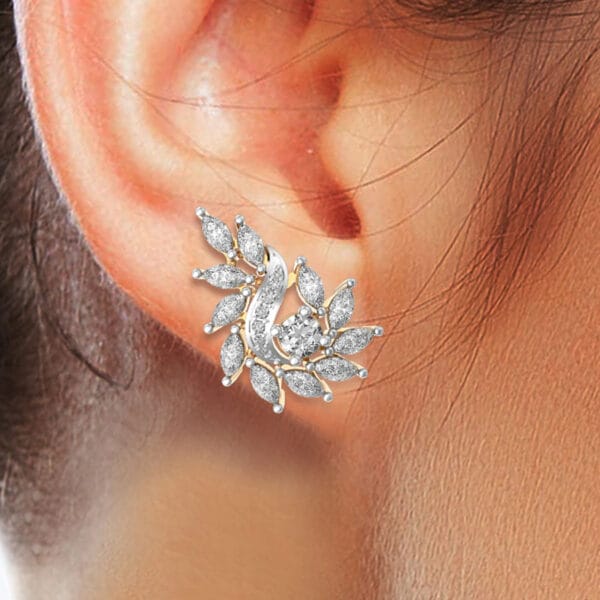 Human wearing the 0.15 Ct Impressive Illuminations Solitaire Diamond Earrings