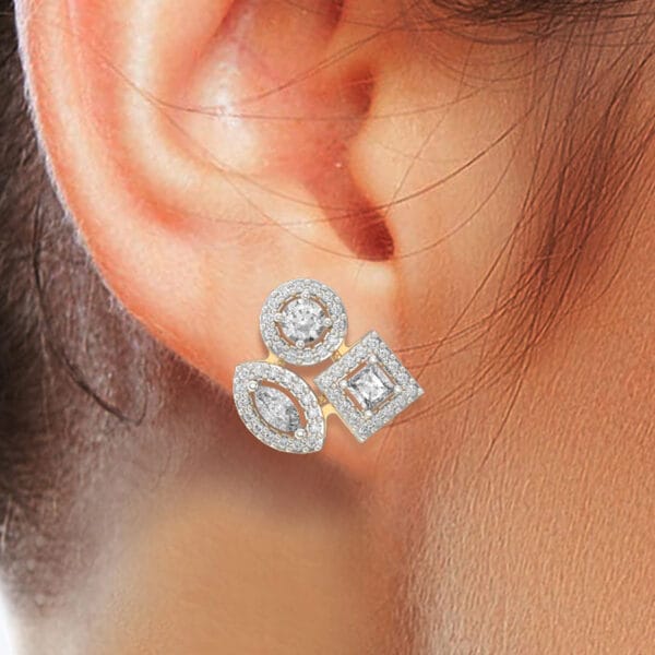 Human wearing the 0.15 Ct Lovely Lachesis Solitaire Earrings In Yellow Gold For Women (Halo)