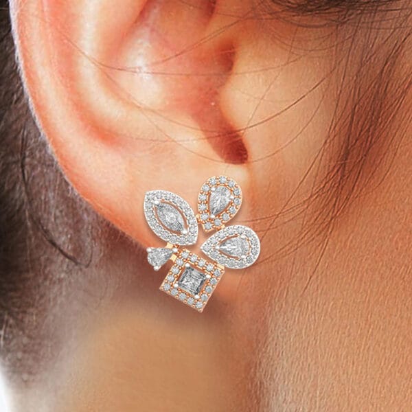 Human wearing the 0.15 Ct Precious Passion Solitaire Diamond Earrings