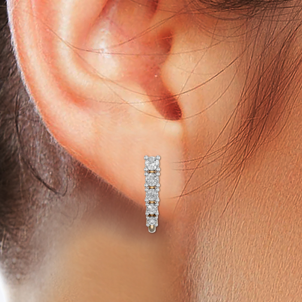 Human wearing the Lustrous Stream Diamond Earrings