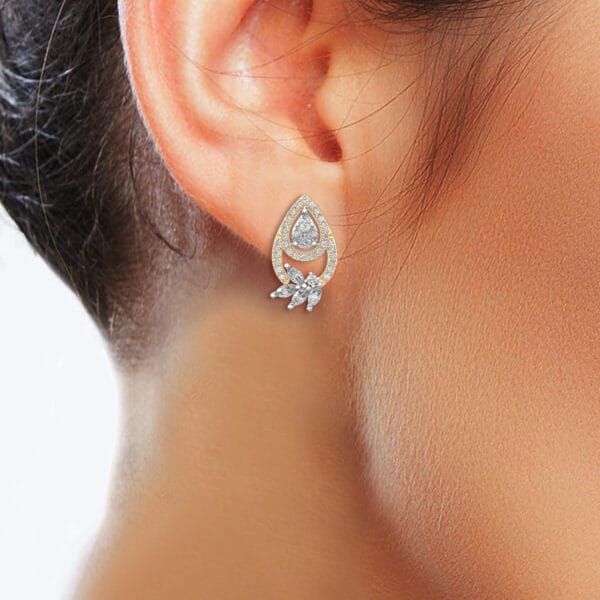 Human wearing the Ornate Ooze Diamond Earrings