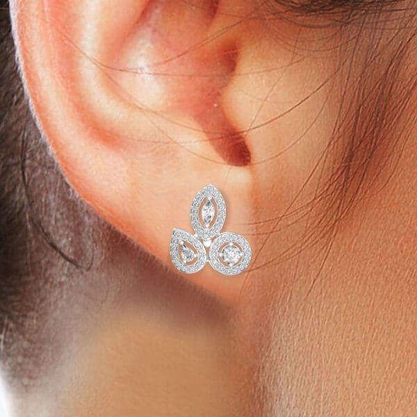 Human wearing the Polyhymnia Pageantry Diamond Earrings