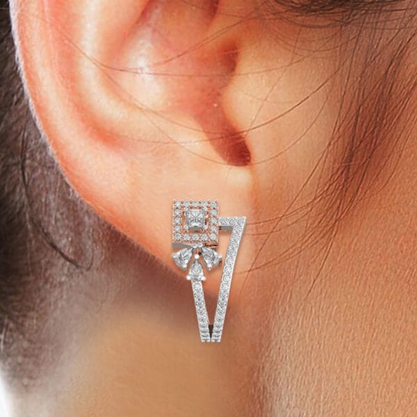 Human wearing the Sensuous Angles Diamond Earrings