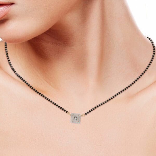 Human wearing the 0.30 Ct Queenly Quadrate Solitaire Diamond Mangalsutra