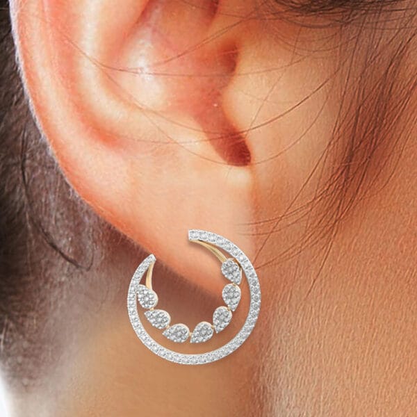 Human wearing the Crescent Charmer Diamond Earrings