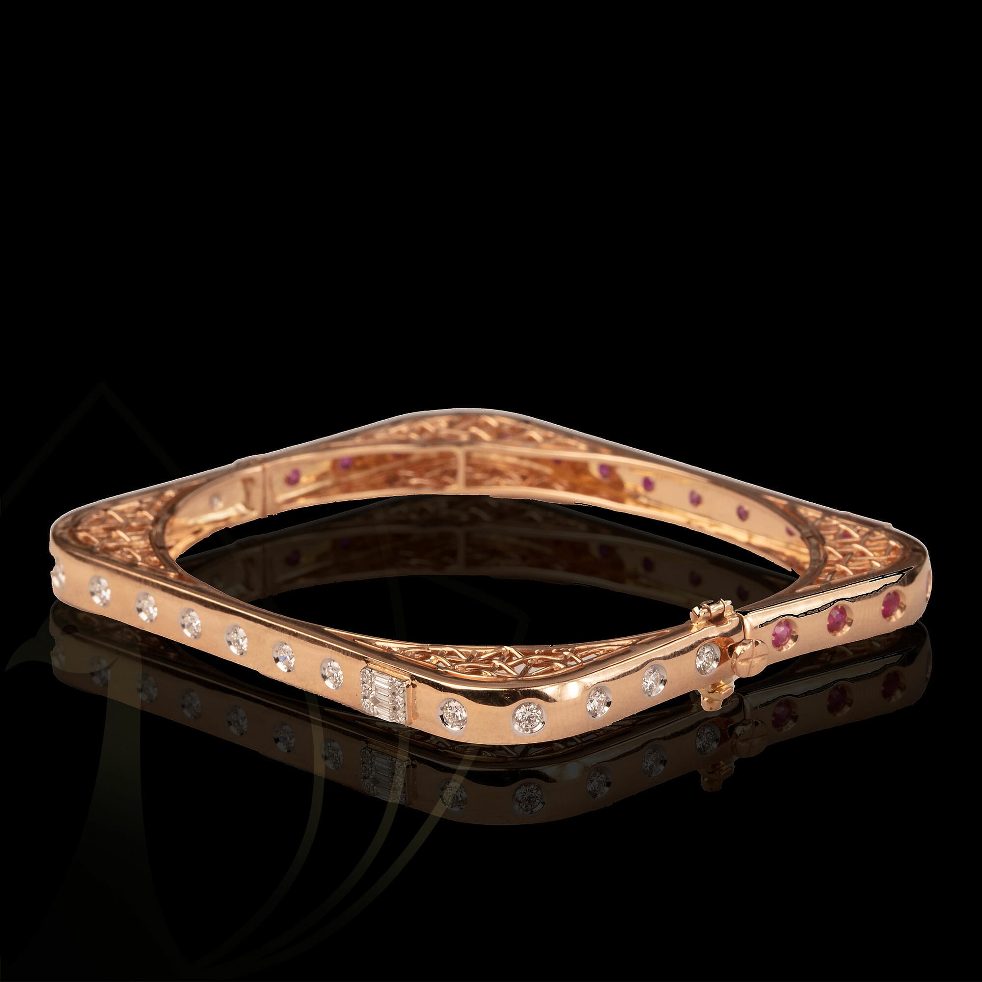 The sassy chic square diamond bangle in trendy rose gold.