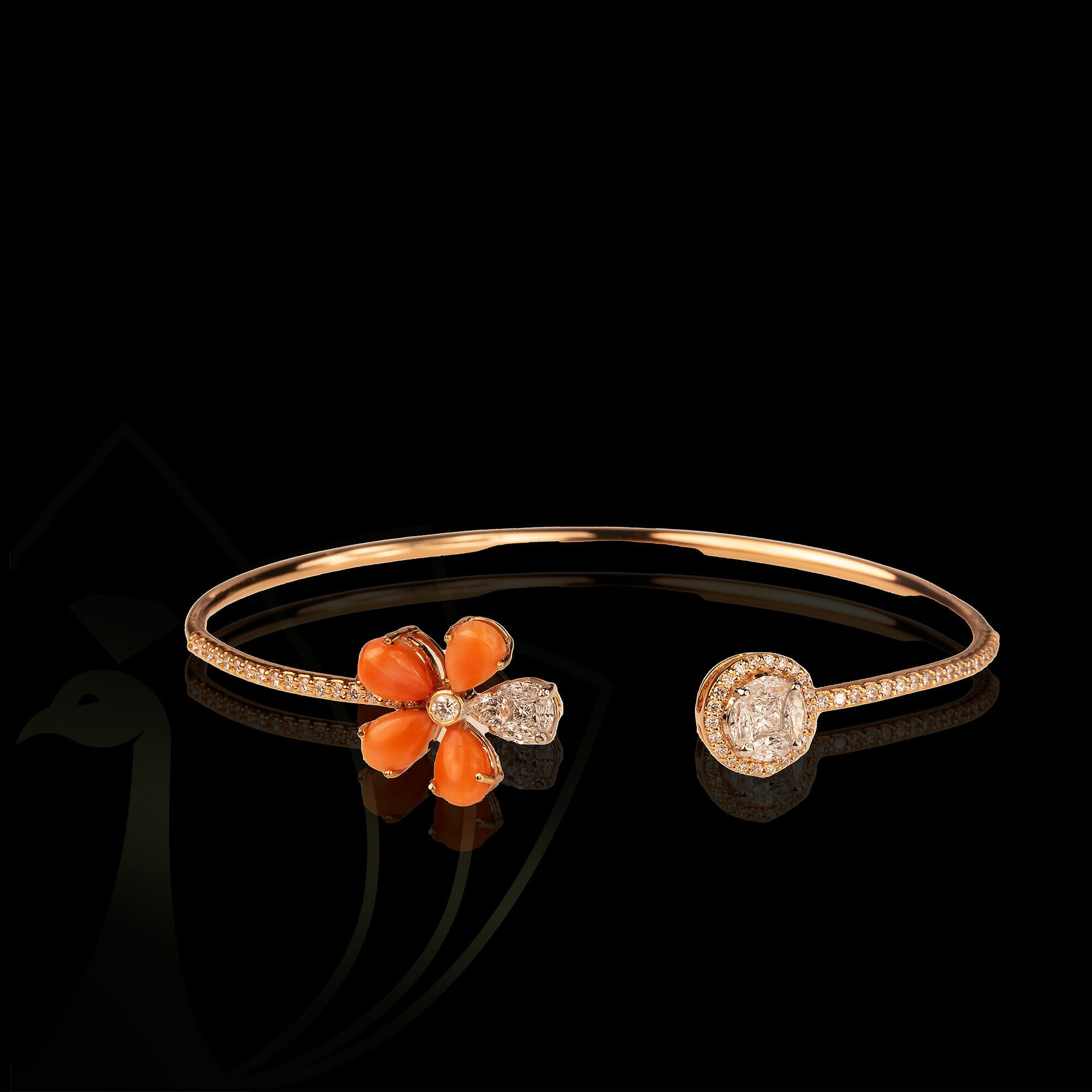 A bountiful blossom diamond bracelet with coral pears.