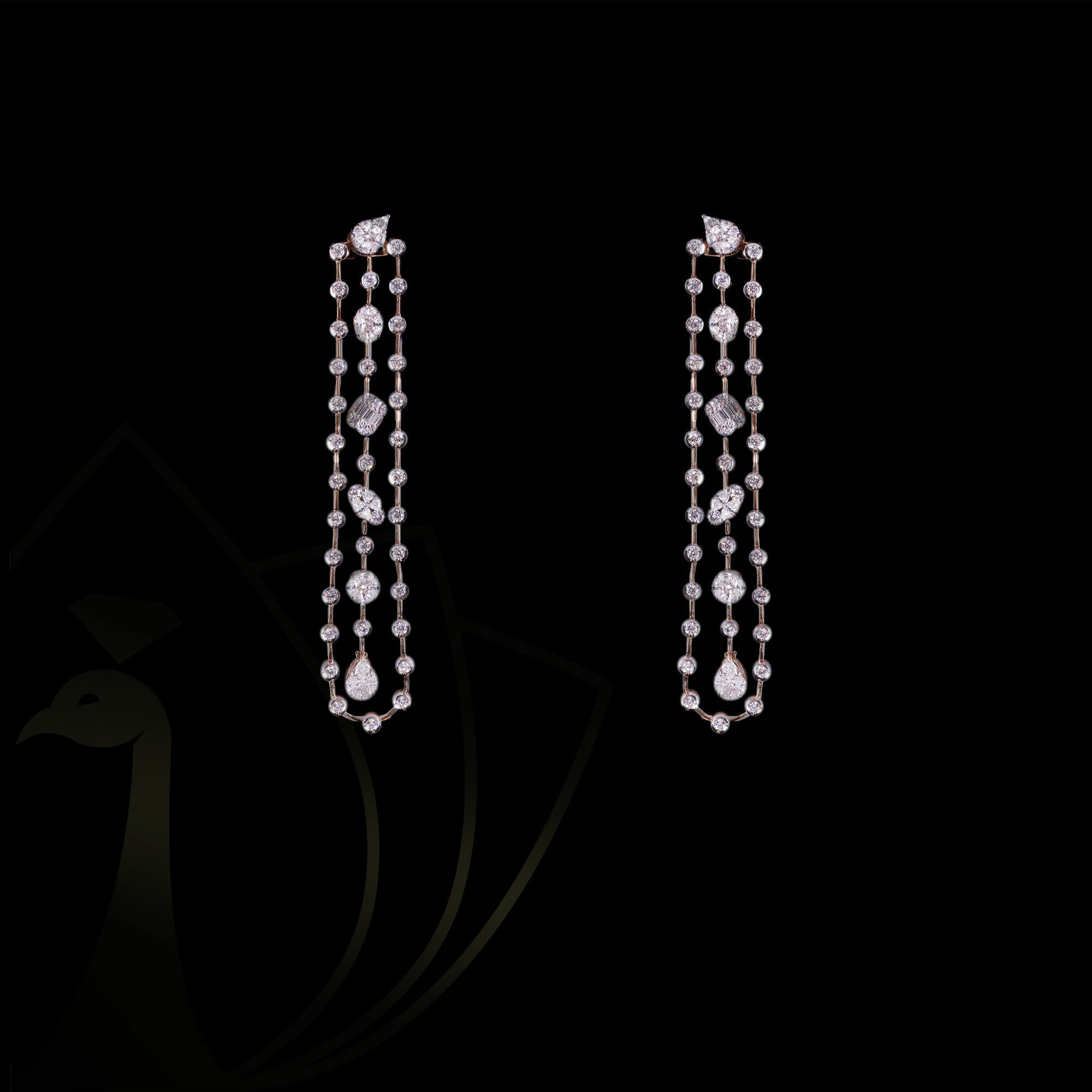A pair of classic symphony diamond chandelier earrings.