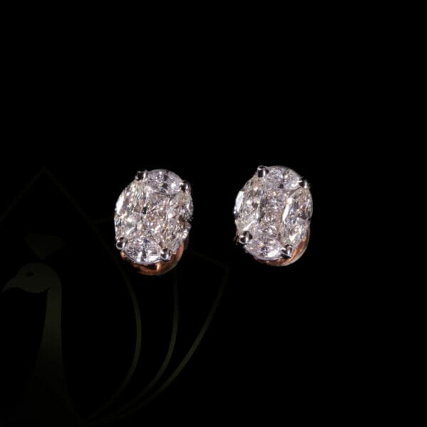 A pair of opulent oval diamond earrings.